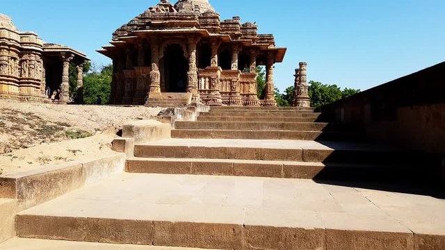 Modhera Sun Temple: Walk up the steps to the &lsquo;Sabha Mandap&rsquo; or the assembly and convene with sculpted renderings of twelve &lsquo;Adityas&rsquo; (another name for the sun god).