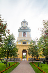 Hollola, Finland - 9 September 2019: Bell tower of old medieval stone church of St. Mary in Hollola, Finland