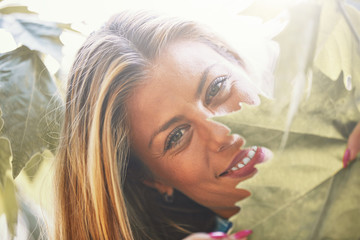 Young woman enjoying in autumn colored nature.