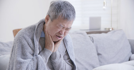 asian elderly man feel sick