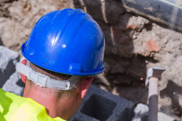 Heavy work for a construction worker on the site.