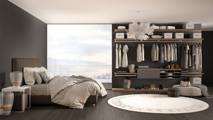 Luxury white and gray modern bedroom with double bed and walk-in closet, parquet floor, panoramic window with winter panorama, carpet, pouf, minimal architecture interior design