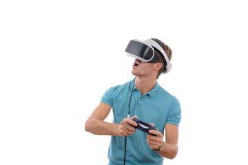 Caucasian young boy playing with reality glasses and virtual console controller dressed in a blue polo shirt isolated in white background
