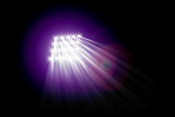 Searchlight illuminates. Floodlights illuminating the stadium. Sports event. Scene, stage light...