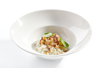 Risotto with roasted pear and almond closeup