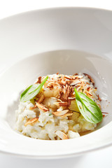 Risotto with roasted pear and almond closeup