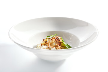 Risotto with roasted pear and almond closeup