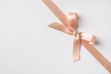 top view of pink bow isolated on white background