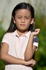 A Young Filipina Female Waiting
