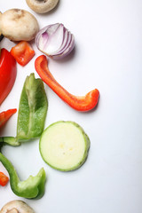 mix of cut vegetables isolated on white background. Image contains copy space