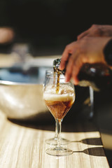 Serving soft drinks at the bar counter
