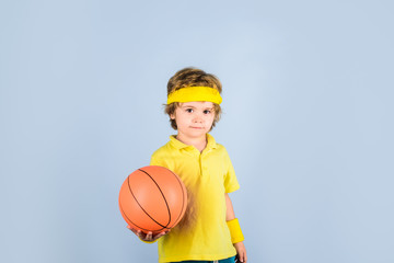 Basketball player in sportswear. Sport active. Hobby sport concept. Kid holds basketball. Sporty...