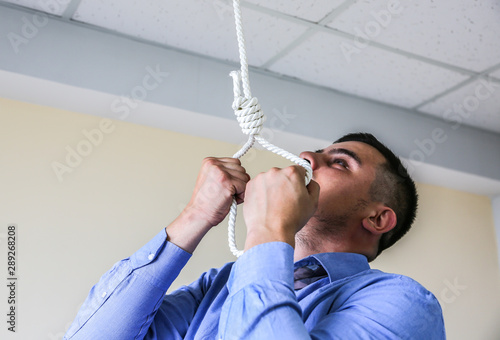 Office Worker With Noose In Hands Suicide Concept Hanging