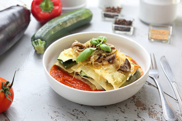 Vegetable lasagne with sweet chilli sauce. Vegetables layered with corn flakes