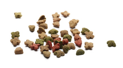 Pet food, granules in metal bucket isolated on white background