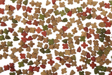 Pet food, granules isolated on white background, top view