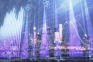 Double exposure of financial chart on Moscow city downtown background. Concept of stock market analysis
