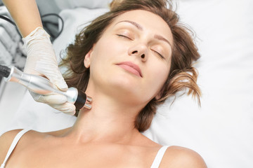 Dermatology skin care facial therapy. Medical spa anto wrinkles procedure. Woman face rejuvenation....