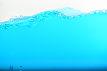 Blue water and air bubles on white background