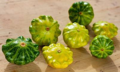 group of different varieties of squash zucchini