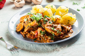 Fresh turkey ragout with mushrooms