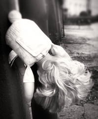 Doll upside down as a symbol of child abuse