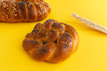 Challah bread on rustic wooden background, top view, copy space