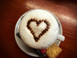 chocolate heart with cup of coffee