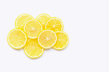 Fresh lemon slices on white. Copy space