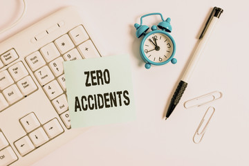 Conceptual hand writing showing Zero Accidents. Concept meaning important strategy for preventing workplace accidents White pc keyboard with empty note paper above white background