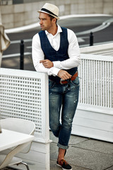Handsome man in daily casual outfit walking resting outdoor