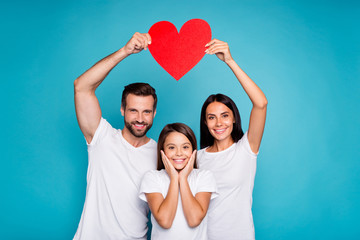 Foster family taking care of little daughter show heart figure wear casual outfit isolated blue background