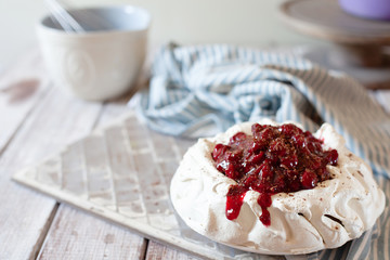 Delicious Pavlova cake with cherry