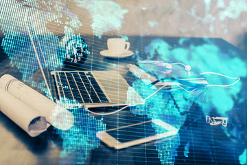 Double exposure of business theme icons and work space with computer background. Concept of success.