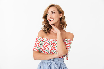 Happy young cheery positive woman posing isolated over white wall background.
