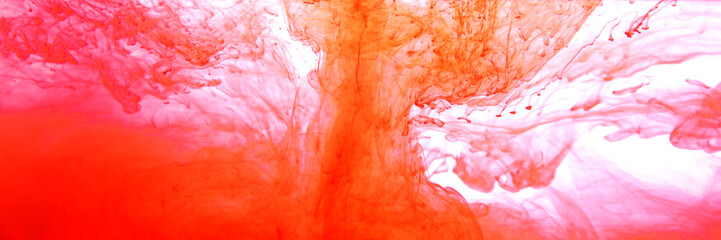 Red watercolor on a white paper background.