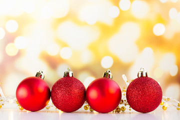 Christmas or new year decorations,  red  balls with  bokeh lights