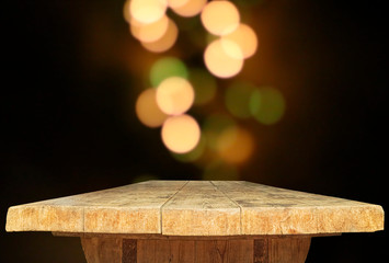 Wooden table top with abstract blurred bokeh background. Table top.