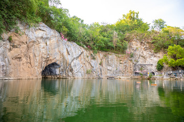 Fototapeta na wymiar Lake and roks in Danzhou Stone Flower Caves, Geopark next to Haikou, Hainan, China