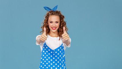 beautiful funny girl on colored blue background