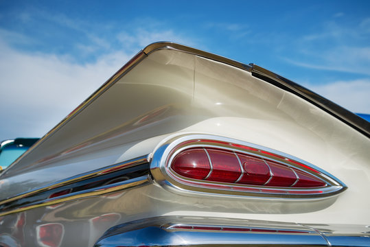 Tail fin and taillight details of a white 1959 Chevrolet Impala Convertible classic car on October 17, 2015 in Westlake, Texas.