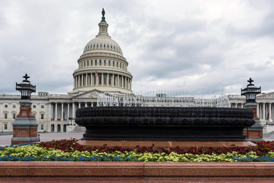 US Congress dome with water fountain splashing - image