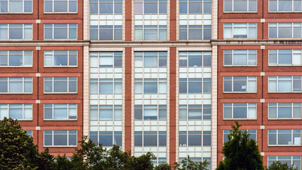 Fototapeta na wymiar Building facade with windows, texture, architecture - image