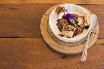 cookie with toast Marshmallow on wooden table in cafe