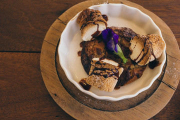 cookie with toast Marshmallow on wooden table in cafe
