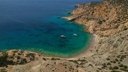 Fototapeta na wymiar Aerial drone photo of Ganoupas and Leonidas paradise beaches with beautiful emerald and turquoise sea and small volcanic bays, Kato Koufonisi, Small Cyclades, Greece