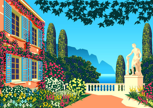 Flower garden near a country house with a statue, park, sea and mountains in the background on a sunny summer day.