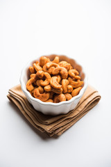 Masala Kaju or spicy Cashew in a bowl. Popular festival snack from India/asia, also known as Chakna recipe