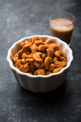 Masala Kaju or spicy Cashew in a bowl. Popular festival snack from India/asia, also known as Chakna recipe