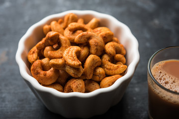 Masala Kaju or spicy Cashew in a bowl. Popular festival snack from India/asia, also known as Chakna recipe